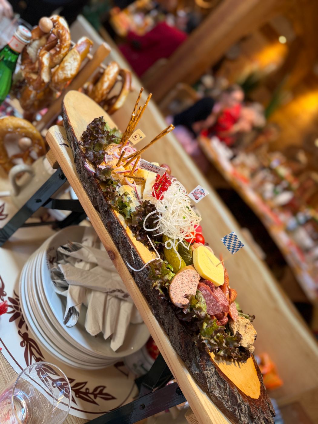 A Brotzeit board of cured meats, cheese and radish